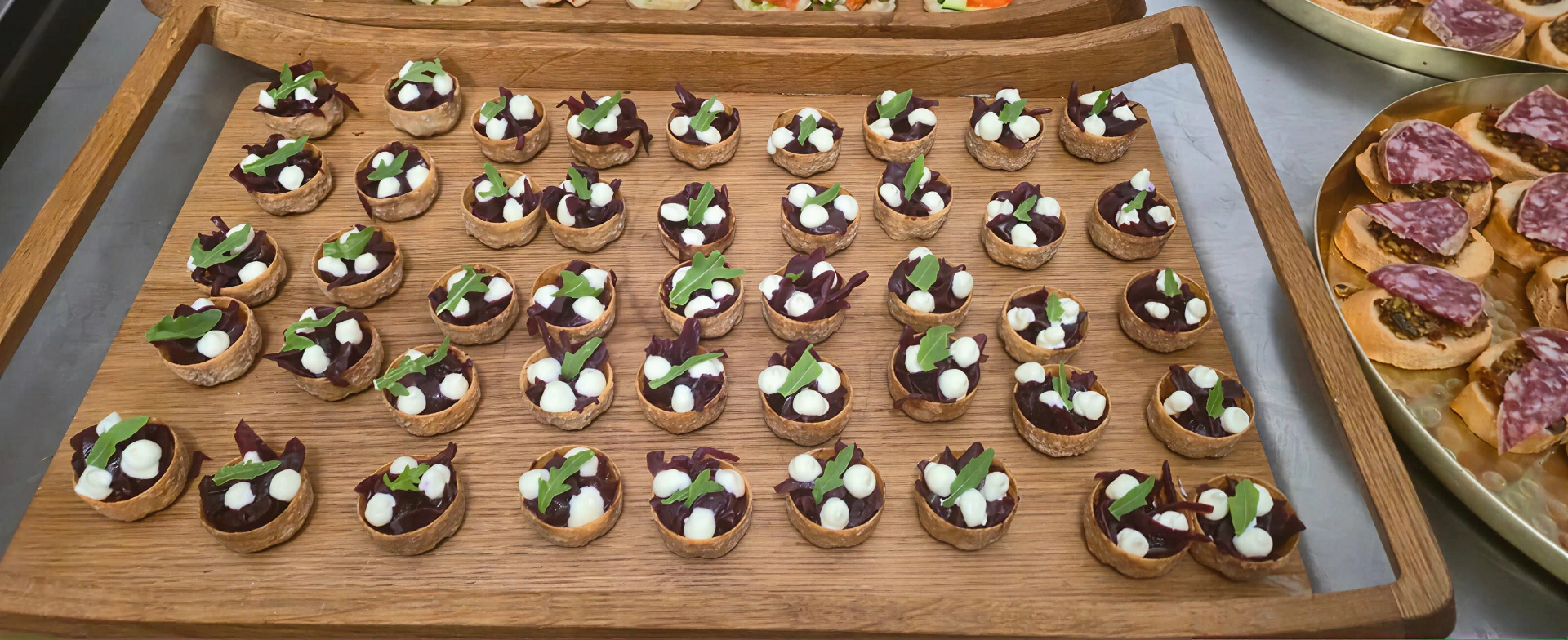 Red onion and goat's cheese tartlets — luxury canapé selection